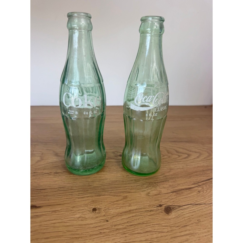 2 Coke Bottlea